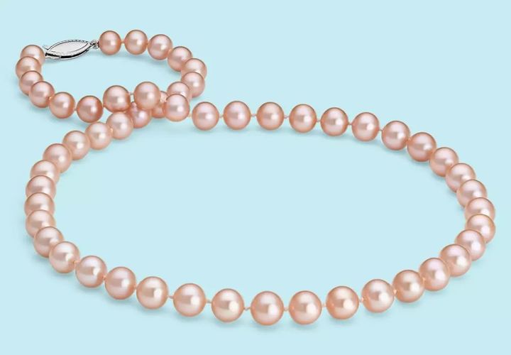 A June birthstone strand of blushed pink, nearly round freshwater cultured pearls