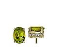 A pair of August birthstone stud earrings of oval-cut peridot stones accented with lateral diamond detail in yellow gold