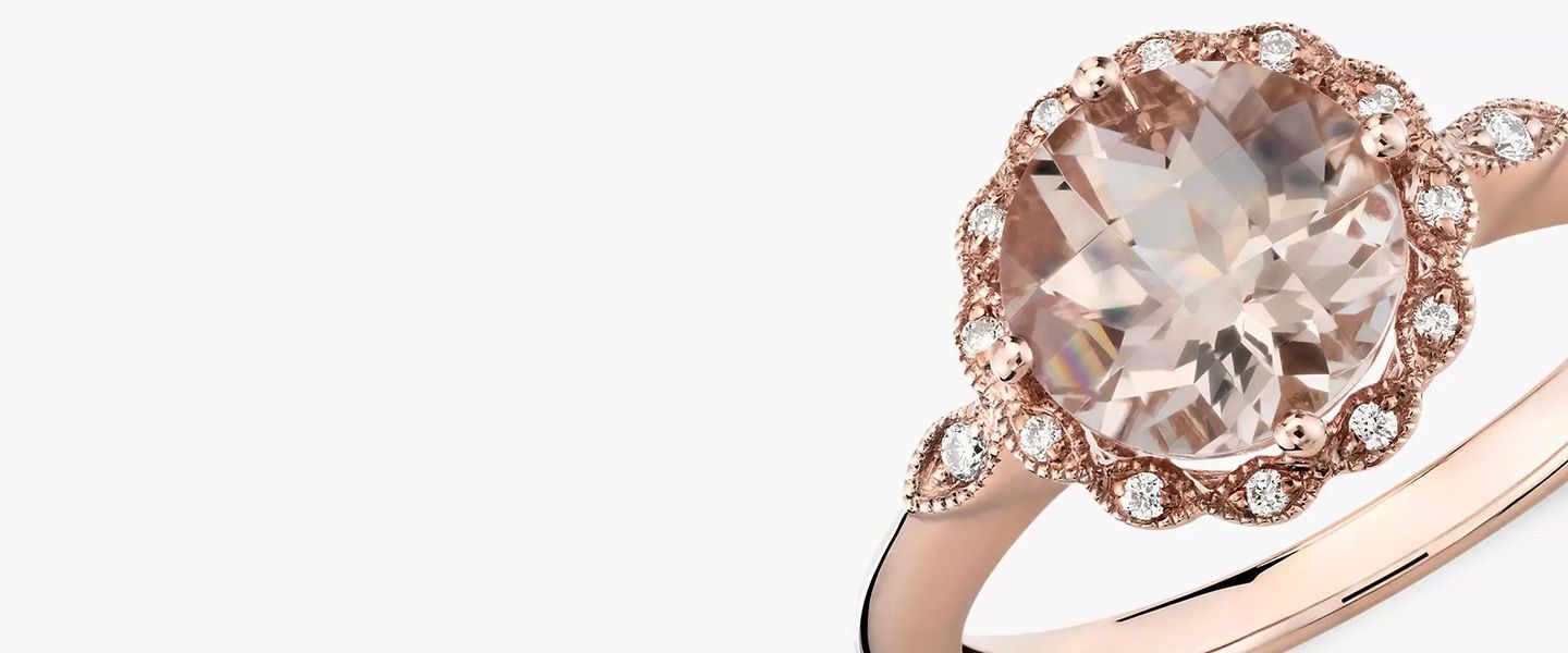 A morganite and diamond pave ring with floral details set in rose gold
