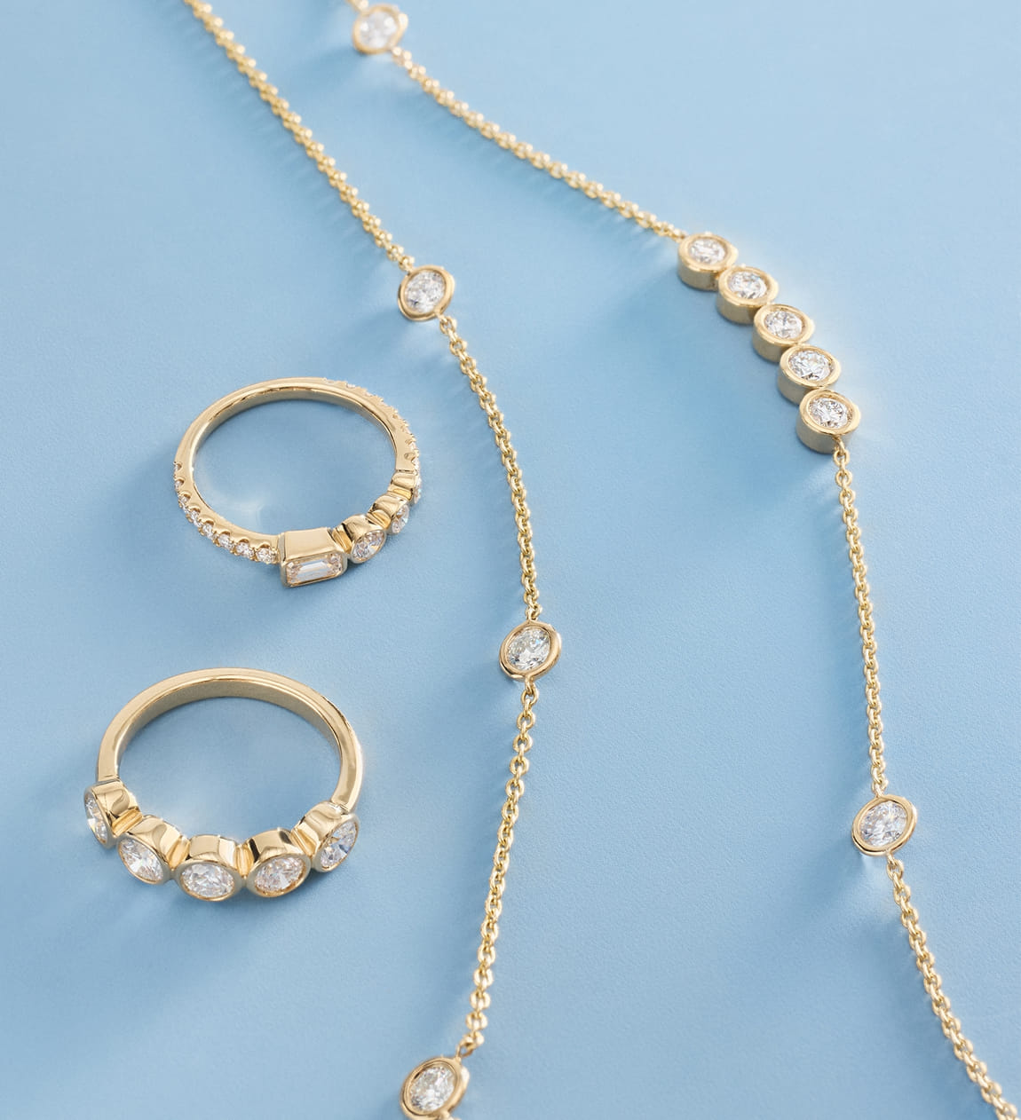 Diamond bezel set jewelry in 14k yellow gold