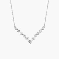 Elegant diamond necklace with a V-shaped design on a fine chain.