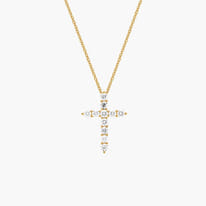Two cross necklaces with diamond accents on silver and gold chains.