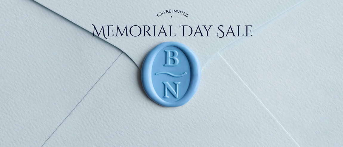 Invitation envelope with Memorial Day Sale text and a blue wax seal.